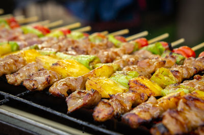 Close-up of meat on barbecue grill