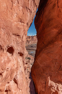 Full frame close-up view of slot passage through sandstone rock formation