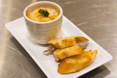 High angle view of serving food in plate on table