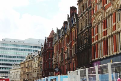 Low angle view of buildings against sky