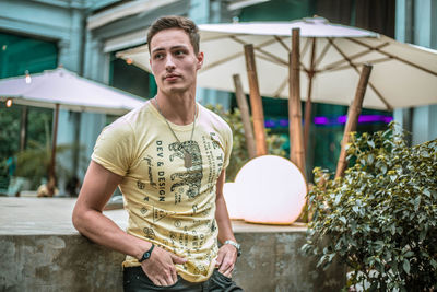 Thoughtful young man standing outdoors