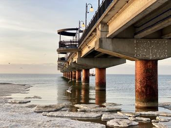 View of bridge over sea against sky