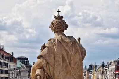 Low angle view of statue against cloudy sky