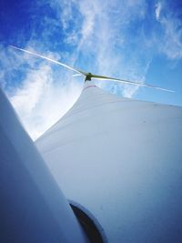 Low angle view of wind turbine against sky