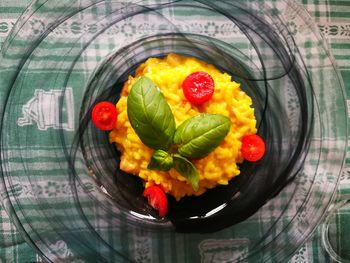 High angle view of fruits in plate on table