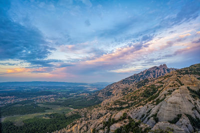 Scenic view of landscape against sky during sunset