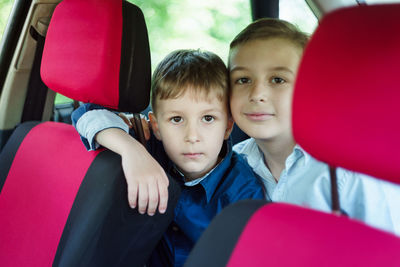 Portrait of smiling family in car