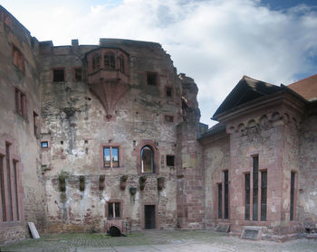 View of historical building against cloudy sky