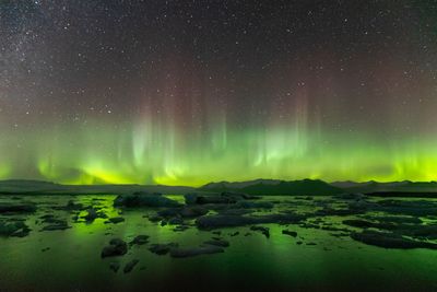 Scenic view of star field against sky at night