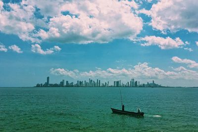 Boats sailing in sea against sky cartagena de indias colombia 