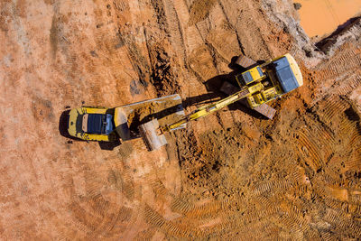 Low section of man standing on rock