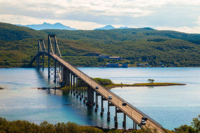 Bridge over lake against sky