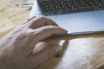 High angle view of man working on table