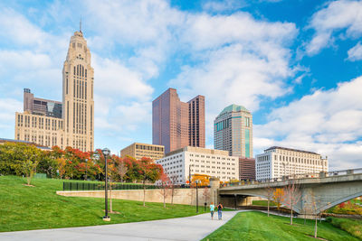 View of buildings against cloudy sky