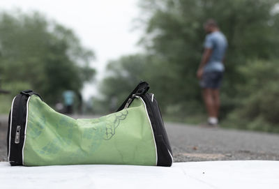 Side view of a man walking in park