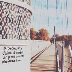 Panoramic view of bridge in city against sky