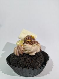 Close-up of chocolate cake against white background