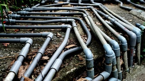 High angle view of pipelines on field