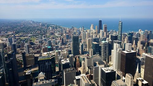 High angle view of cityscape by sea