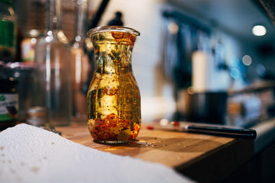 Close-up of glass jar on table