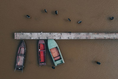 High angle view of boats docked at jetty