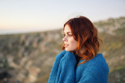 Portrait of woman looking away