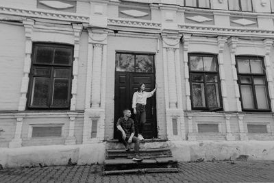 Man in front of building