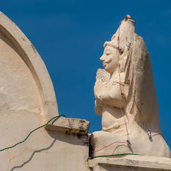 Low angle view of buddha statue