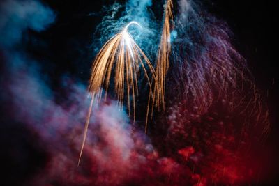 Close-up of firework display at night