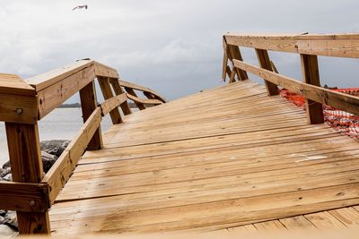 Pier over sea against sky