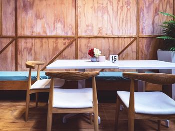 Empty chairs and tables in restaurant