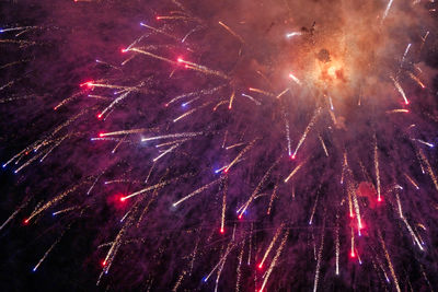 Firework display at night