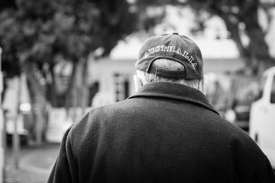 Rear view of man in city street