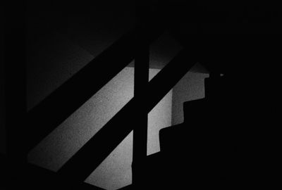 Shadow of railing on staircase