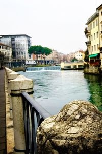 View of canal along buildings