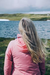 Rear view of woman looking at sea