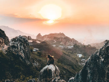 Scenic view of mountains against sky during sunset