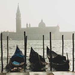 Gondolas on the venetian lagoon in venice, italy in winter