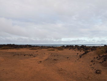 Scenic view of desert against sky