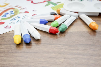 High angle view of multi colored pencils on table