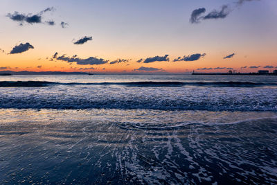 Scenic view of sea against sky during sunset