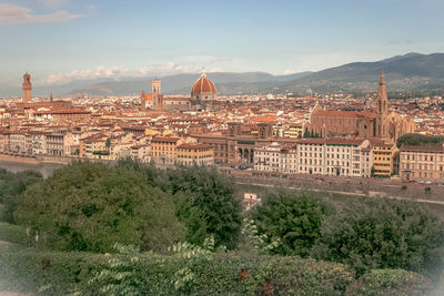 High angle view of townscape against sky in city