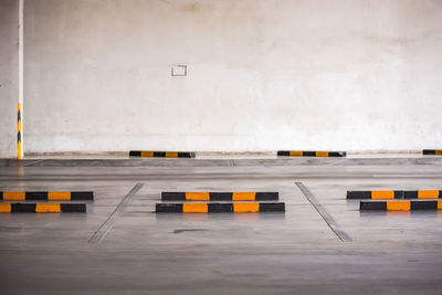 Empty parking lot against sky in city