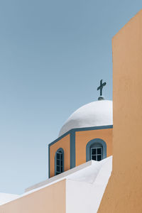 Low angle view of church against clear blue sky