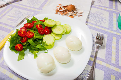 High angle view of salad in plate on table