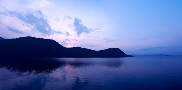 Scenic view of mountains at sunset