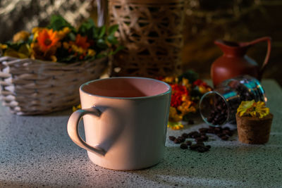 Close-up of coffee cup on table