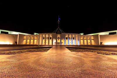 Illuminated building at night