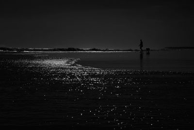 High angle view of man on beach against sky