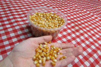 Midsection of person holding food